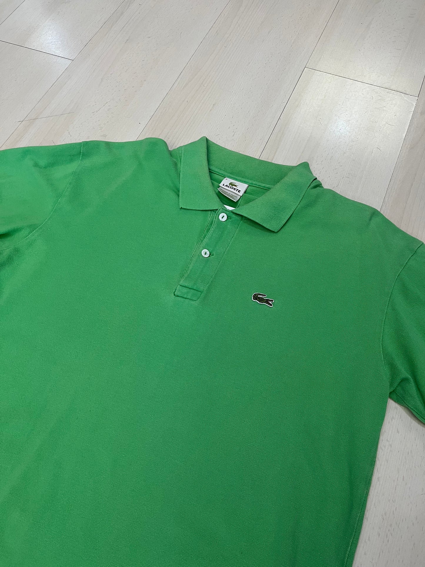 Polo Lacoste verde (H124)